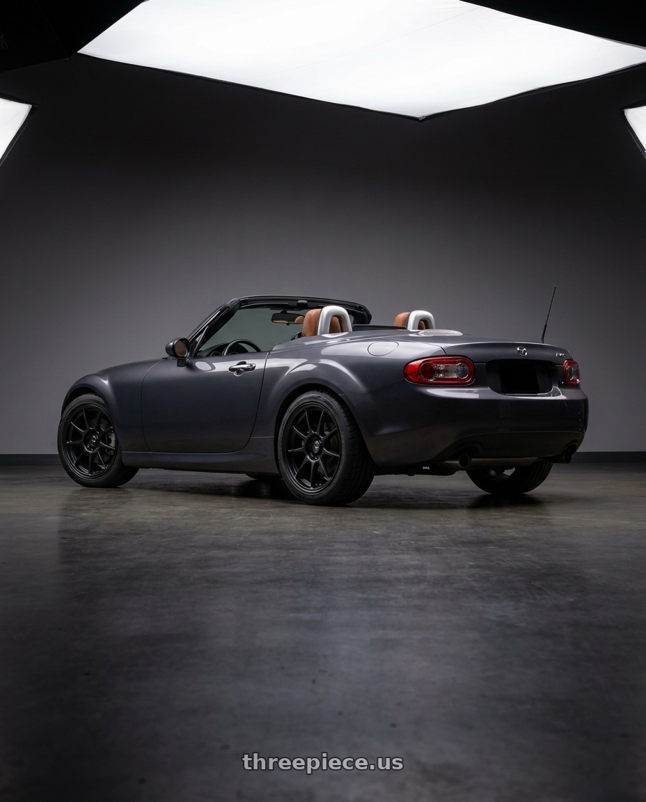 2014 Mazda MX-5 with Konig 57B Dekagram 5x114.3 17x8 +40 Semi-matte Black wheels rear three quarter view square tires