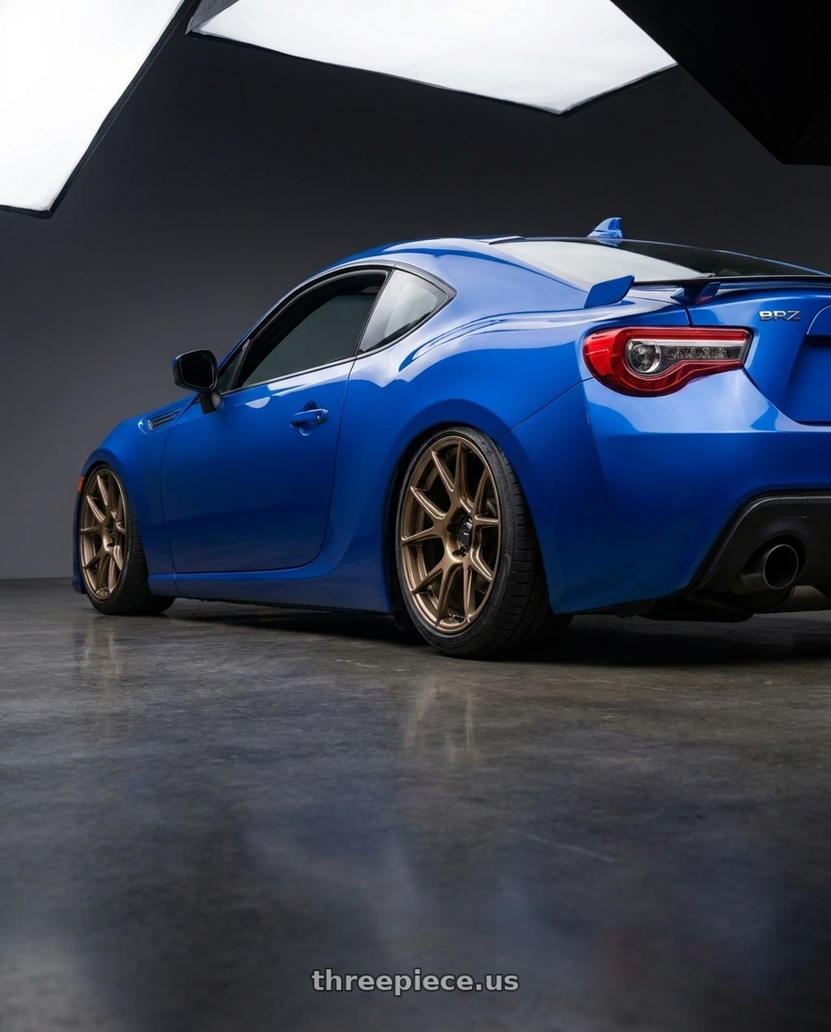 2017 Subaru BRZ with Konig Ampliform 5x100 18x8.5+44 Gloss Bronze wheels rear three quarter view slight stretch tires