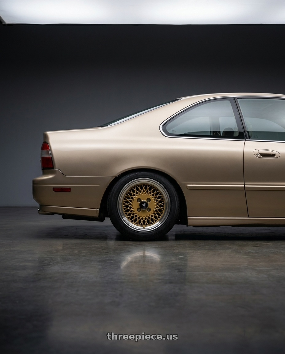 1994 Honda Accord with Enkei Enkei92 Classic Line 4x114.3 15x7+38 Gold wheels rear three quarter view square tires