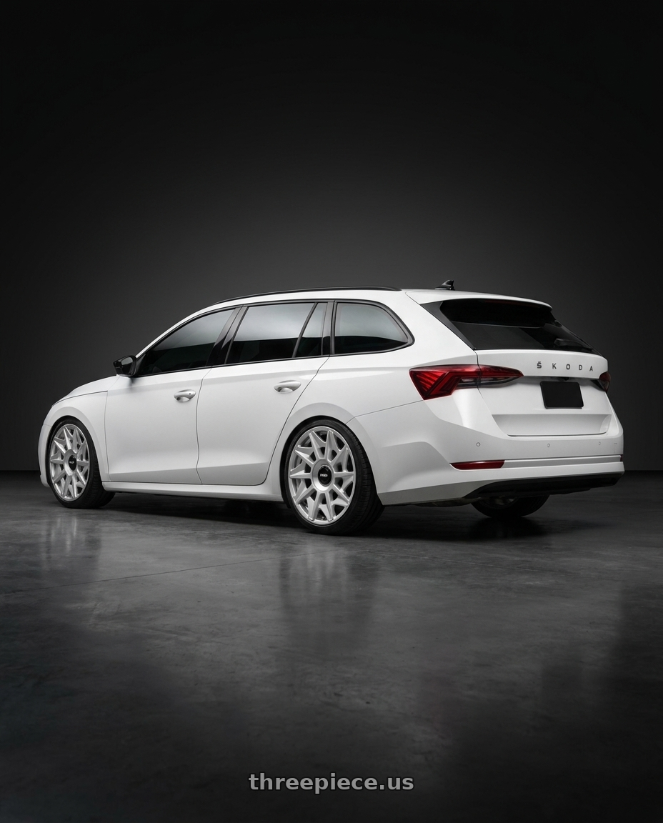 ŠKODA Octavia 2025 with Rotiform 1PC R124 CVT 5X112 19X8.5 +45 GLOSS SILVER wheels rear three quarter view square tires