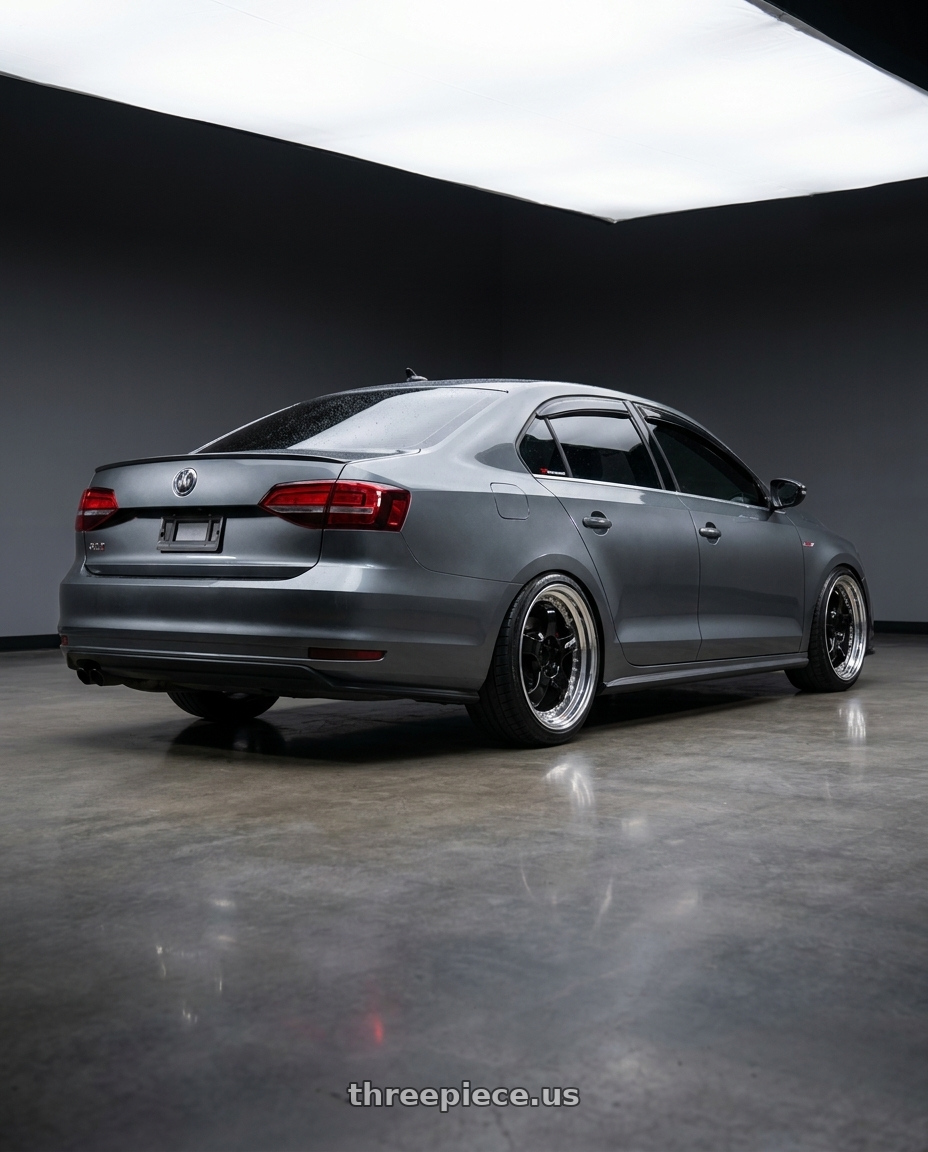 2016 VW GLI with Work Meister S1 3P 5x100 18x7+35 A Disk Black wheels rear three quarter view slight stretch tires