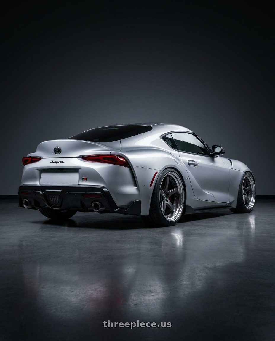 2020 gr supra premium with Work T5R 2P 5x112 20x10.5 +38 Matte Gunmetal wheels rear three quarter view square tires