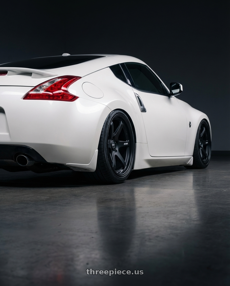 2019 Nissan 370Z with ESR Wheels APEX SERIES AP6 5x114.3 19x9.5 +22 Matte Black wheels rear three quarter view slight stretch tires