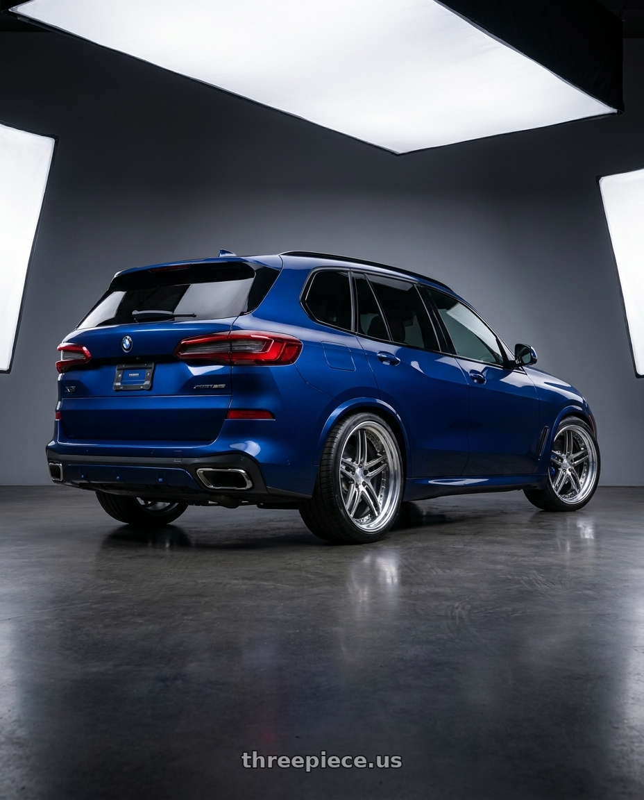 2026 BMW X5 with Work Gnosis Gr205 5x112 21x11+45 W Disk Buff Finish wheels rear three quarter view slight stretch tires