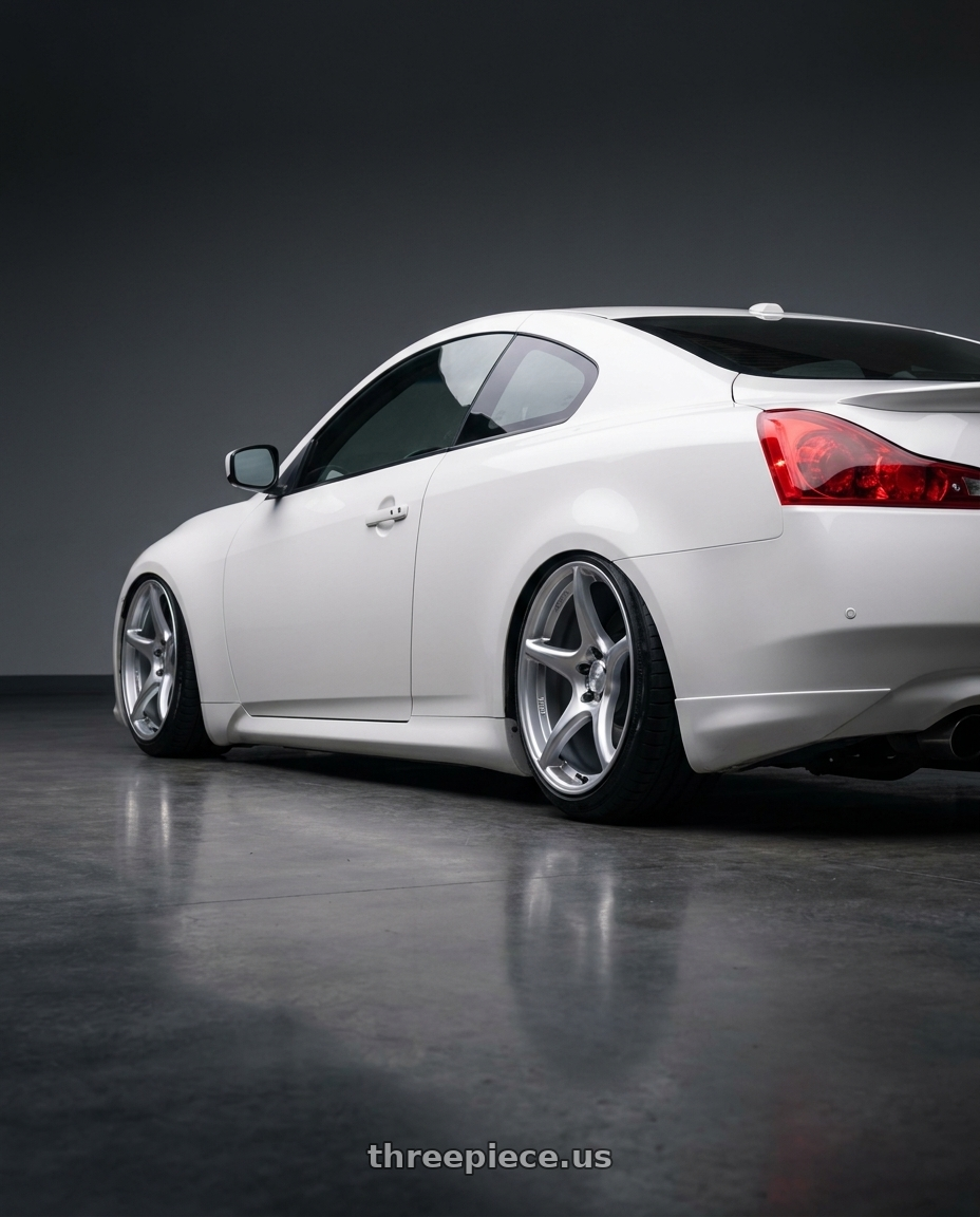 2014 Infiniti G37 Coupe with Kansei K11S Tandem 5x114.3 19x10.5 22 Hyper Silver wheels rear three quarter view slight stretch tires