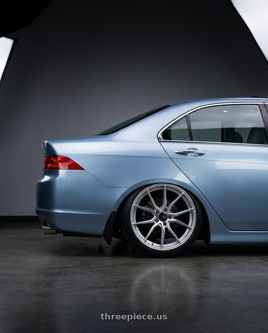 2005 Acura tsx with Advanti Racing 80S Hybris 5X112 18x8 +45 Silver with Machined Face wheels rear three quarter view slight stretch tires