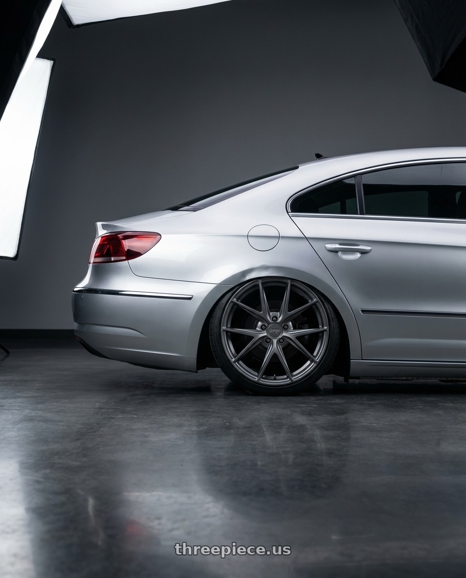 2015 Volkswagen CC with Niche 1PC M116 MISANO 5X112 19X9.5 +38 MATTE GUN METAL wheels rear three quarter view slight stretch tires