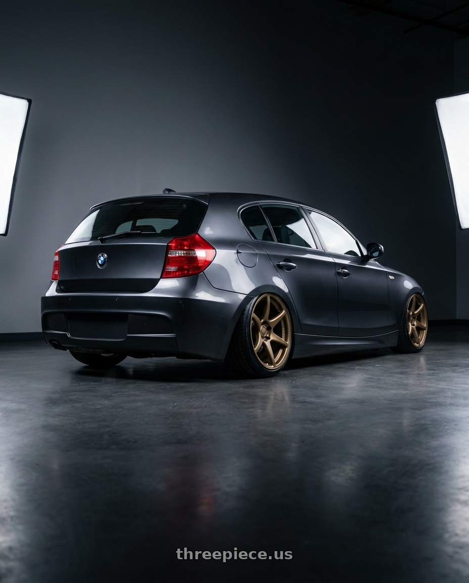 2012 BMW 1 Series E82 with Kansei K11B Tandem 5X120 19x9.5 22 Bronze wheels rear three quarter view slight stretch tires