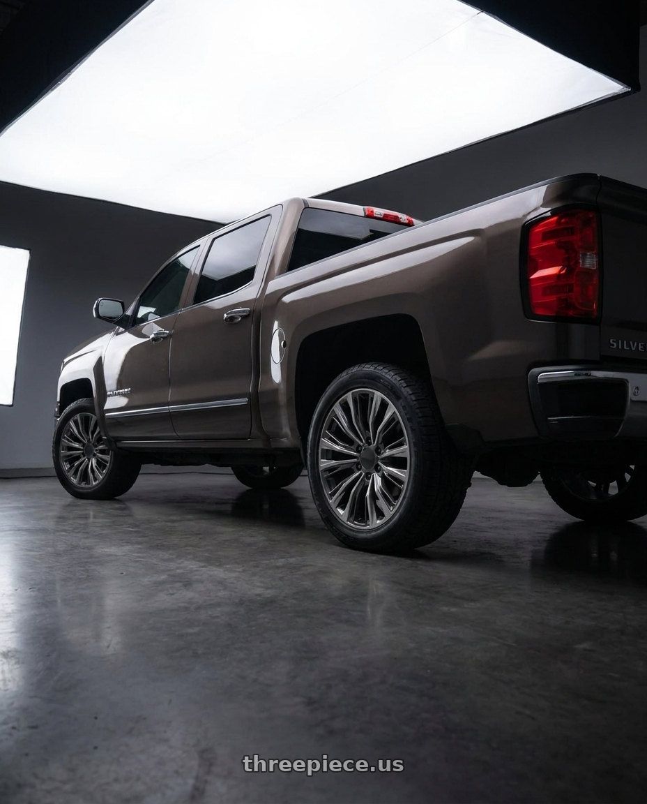 2014 chevy silverado 1500 ltz with OE Wheels CA93 6x139.7 20x9+28 Gunmetal wheels rear three quarter view square tires