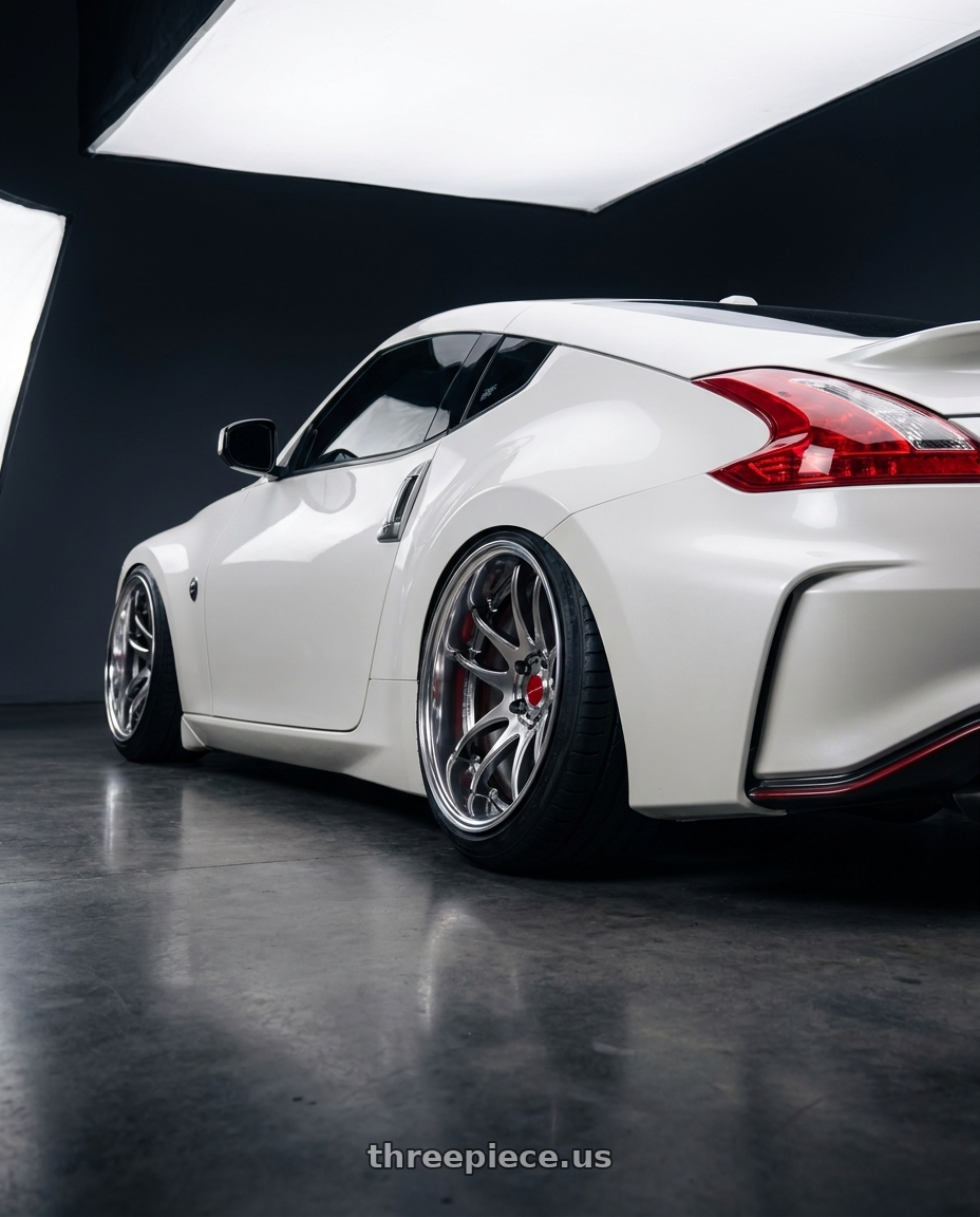2018 Nissan 370z with Work Cr 2P 4x100 17x9.5 +18 GT Silver wheels rear three quarter view extreme stretch tires