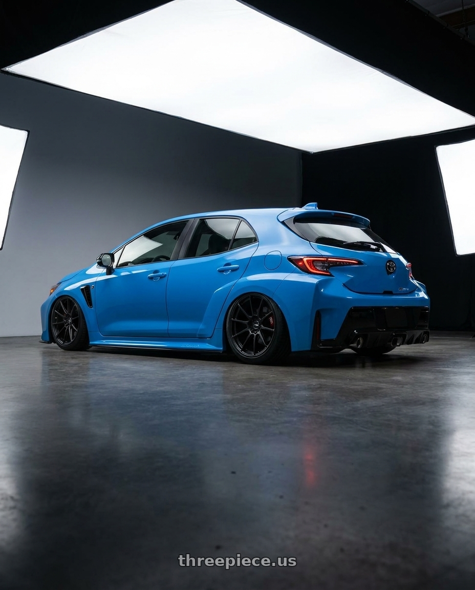 2024 Toyota GR Corolla with Ssr Gtv02 5x114.3 18x8.5+40  FLAT BLACK wheels rear three quarter view slight stretch tires