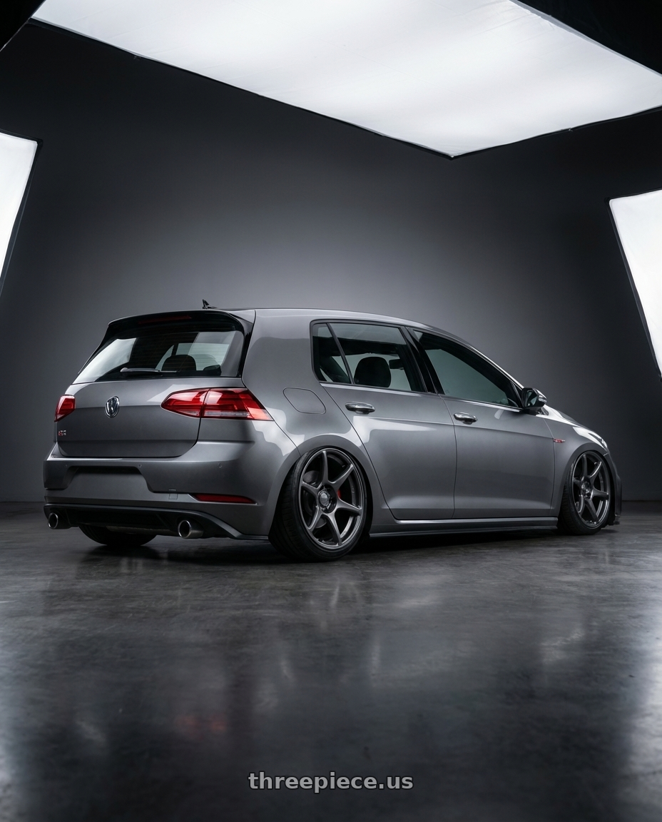 2019 Volkswagen GTI MK7 with Kansei K11G Tandem 5X112 19x9.5 22 Gunmetal wheels rear three quarter view slight stretch tires