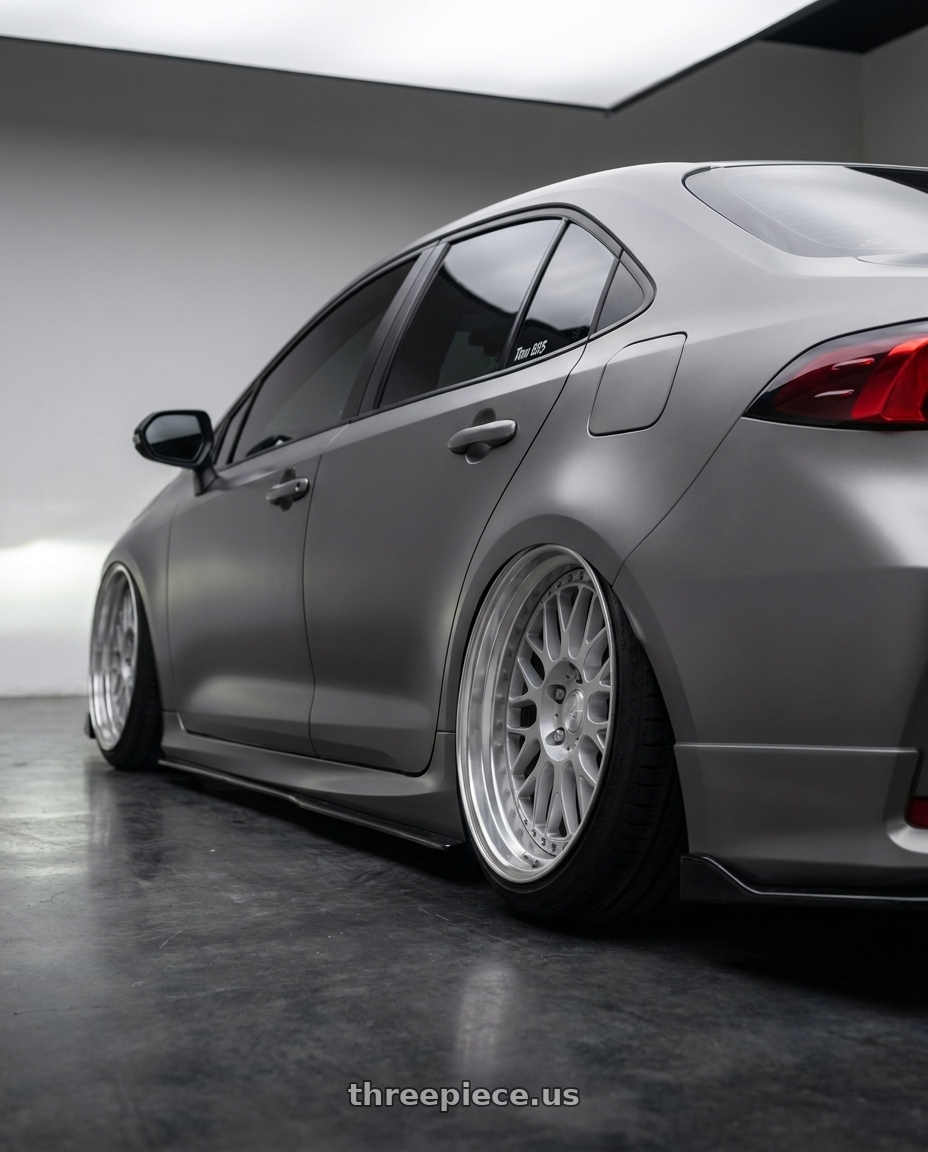 2022 Toyota altis  with Work Vs-Xx 5x100 18x10.5-6 A Disk Light Grey Silver wheels rear three quarter view extreme stretch tires