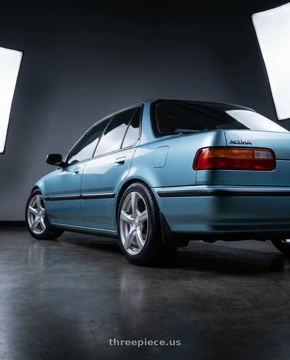 1990 Acura Integra with TOUREN TR9 3190 4x100/4x114.3 16x7 +42 GLOSS HYPER SILVER wheels rear three quarter view square tires