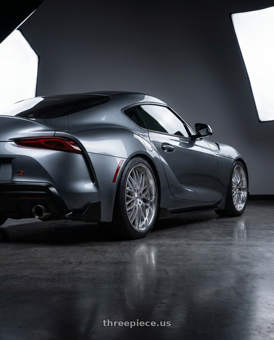 2019 TOYOTA SUPRA with TSW SNETTERTON 5X112 19X9.5 +35 HYPER SILVER W/ MIRROR CUT LIP wheels rear three quarter view square tires