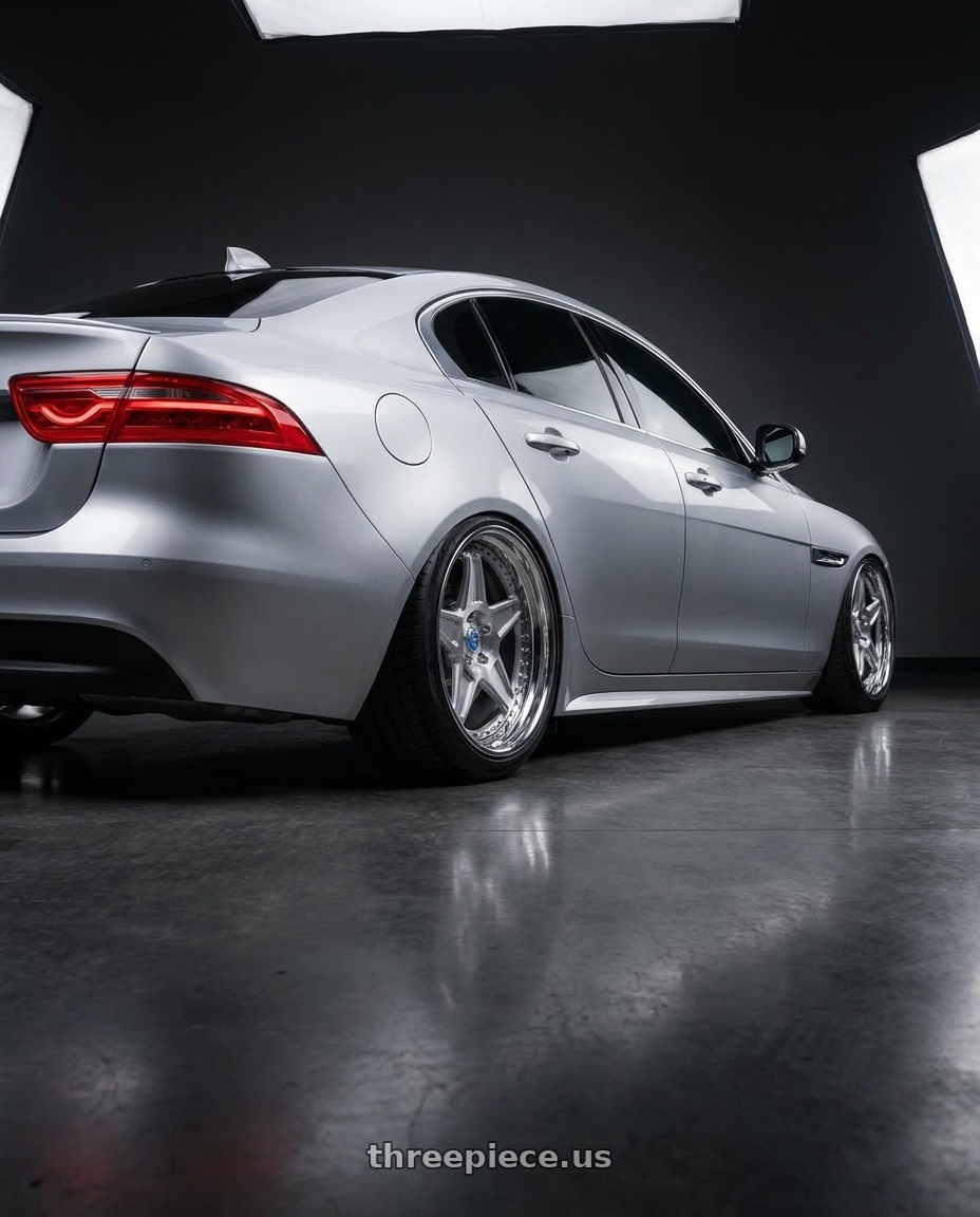 2017 Jaguar X with Modern Concepts MC-13 5x114.3 18x8.5 +30 Brushed Face Chrome Lips wheels rear three quarter view meaty tires