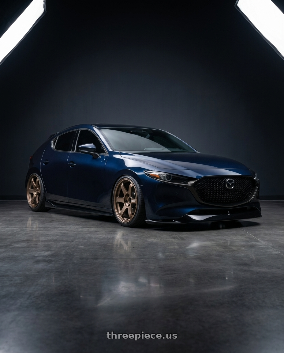 2025 Deep Mica Blue Mazda 3 Hatchback with AeroKit with Volk Racing TE37 Saga S-Plus 5x112 18x10.5+30 Bronze wheels