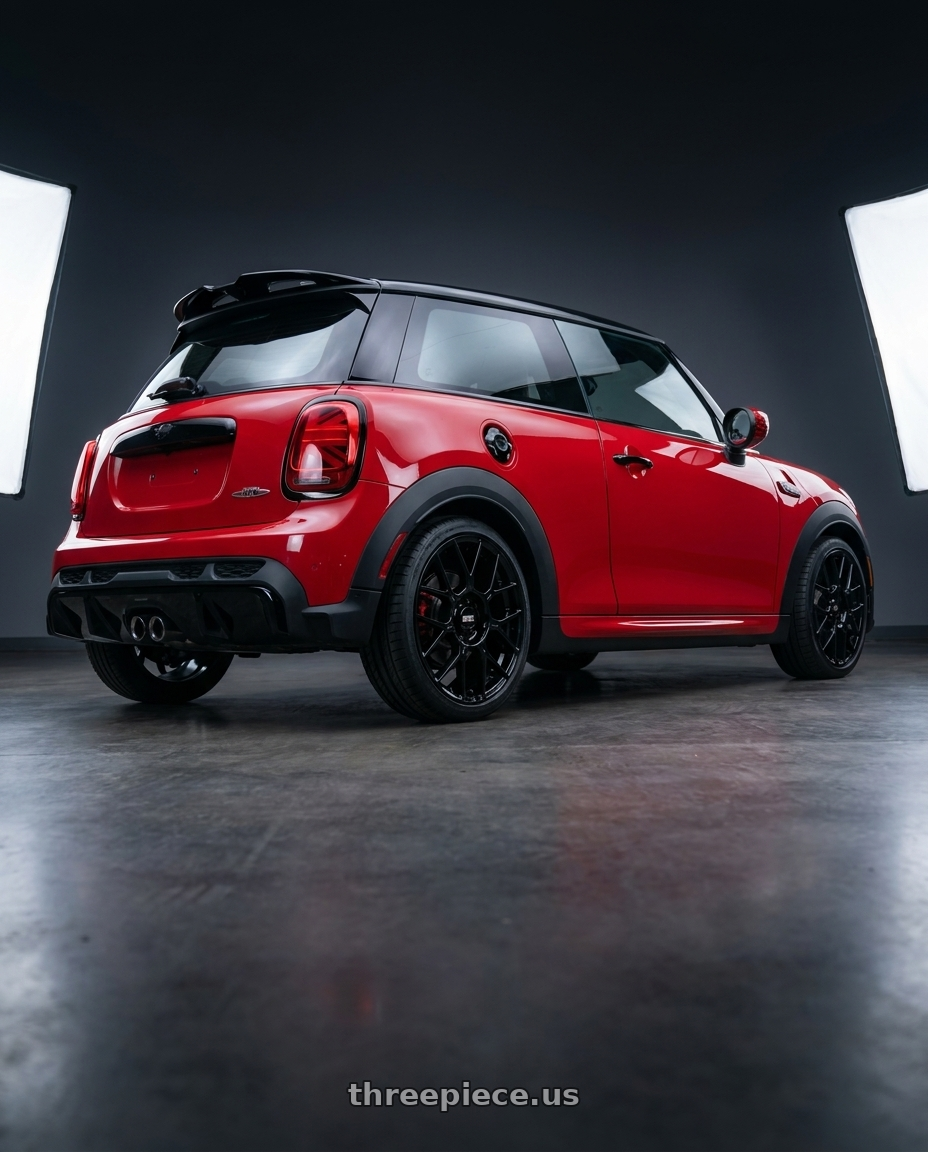 2025 mini jcw with BBS XR 5x112 19x8.5+38 Gloss Black wheels rear three quarter view square tires
