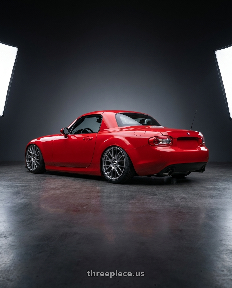 2012 Mazda MX-5 Miata NC with Ssr Gtv04 5x114.3 17×7.0x7+42  METALLIC GRAY wheels rear three quarter view slight stretch tires