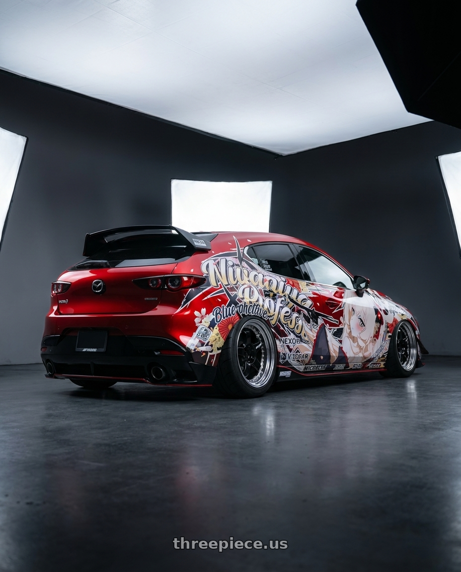 2026 mazda 3 with Work Meister S1 3P 5x100 18x7.5+54 A Disk Black wheels rear three quarter view meaty tires
