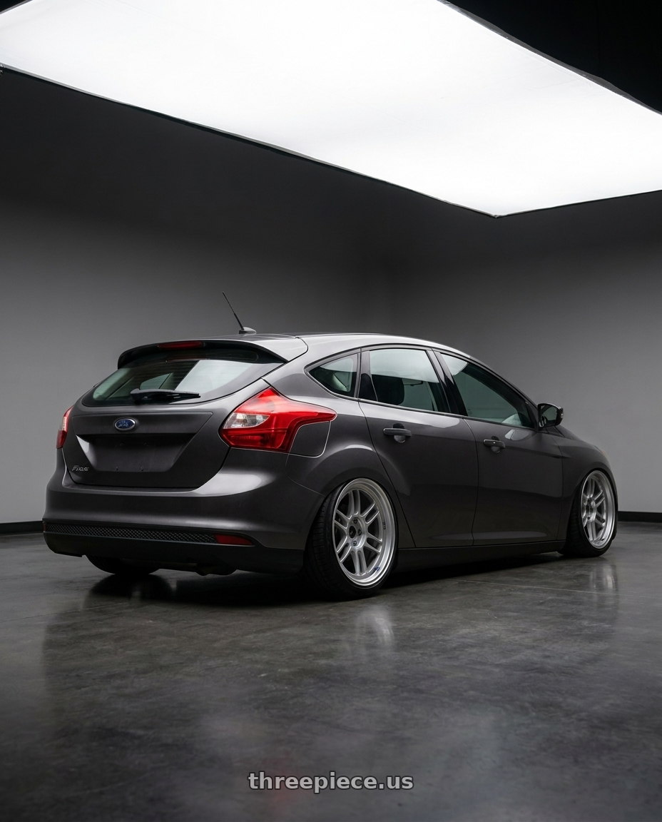 2014 Ford focus with Enkei RPF1RS 5x114.3 18x9.5+12 Silver wheels rear three quarter view slight stretch tires
