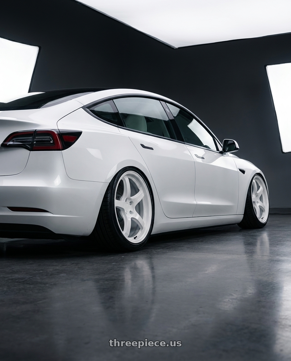 2021 tesla model 3 sr+ white with Gram Lights 57CR 5x114.3 18x9.5 +38 CERAMIC WHITE PEARL wheels rear three quarter view slight stretch tires