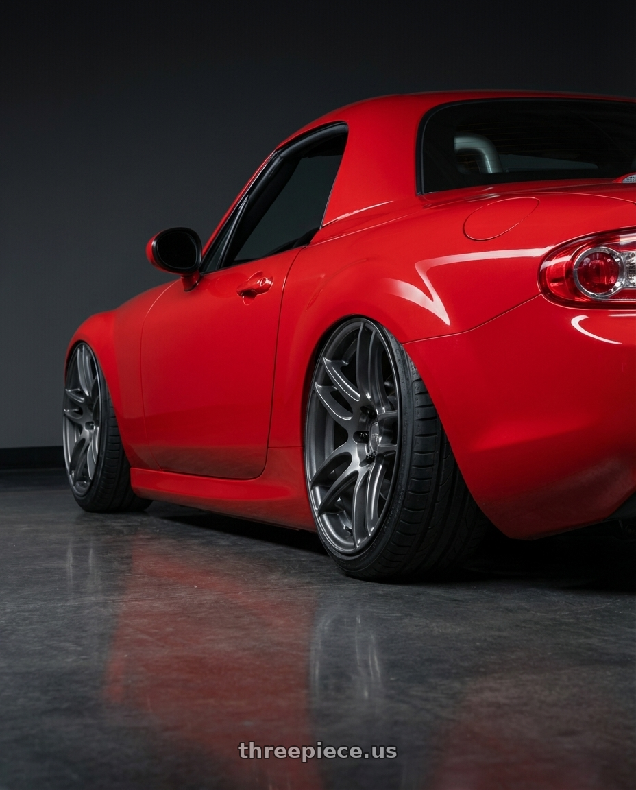 2012 Mazda MX-5 Miata NC with Niche 1PC M105 NR6 5X114.3/5X120 17X7.5 +45 MATTE GUN METAL wheels rear three quarter view slight stretch tires