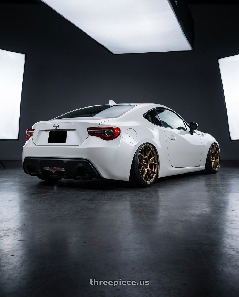 2016 Scion FR-S with Konig Ampliform 5x100 18x8.5+44 Gloss Bronze wheels rear three quarter view slight stretch tires