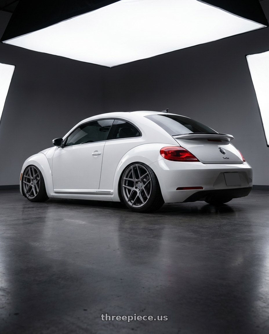 2016 Volkswagen Beetle Turbo with Aodhan AFF2 5x112 19x8.5+35 Matte Gray wheels rear three quarter view slight stretch tires