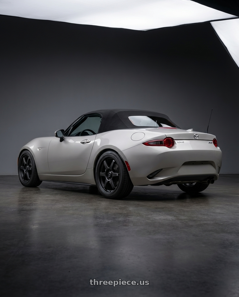 2021 Mazda MX-5 Miata ND with Konig Backbone 5x114.3 17x7.5+35 Matte Black Milling Logo on Spoke wheels rear three quarter view square tires