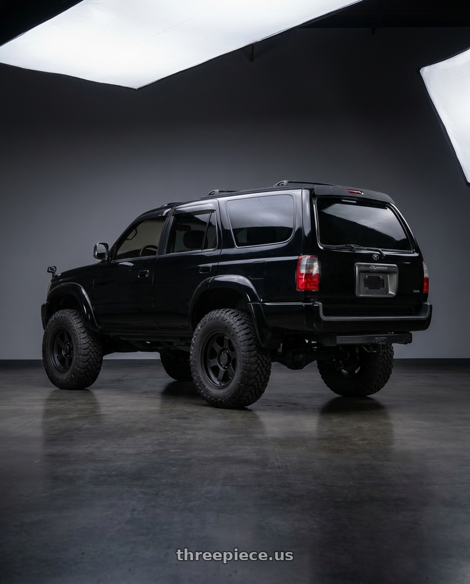 2001 Toyota 4runner with 9six9 SIX-1 Deep 6x139.7 17X8.5 -10 Matte Black wheels rear three quarter view meaty tires