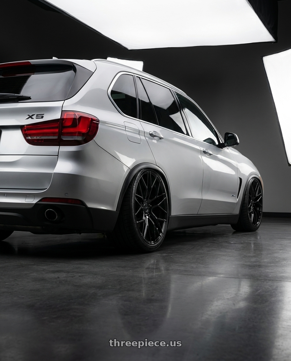 2018 Bmw x5 with KATANA RACING KR01 5x114.3 17x7.5 +40 Glossy Black wheels rear three quarter view slight stretch tires