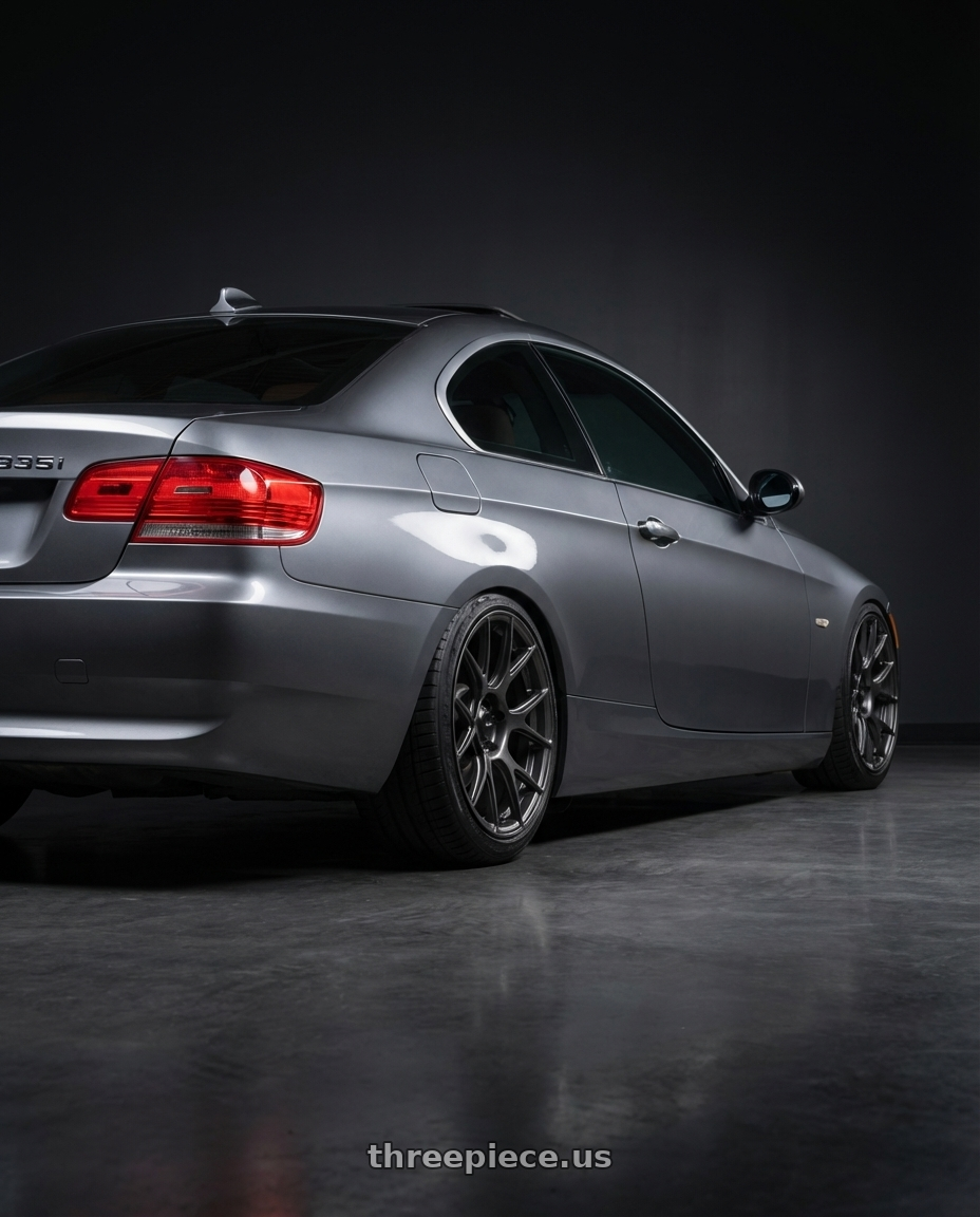 2008 BMW 335i E92 Space Grey Metallic  with Konig Ampliform 5x120 18x9.5+35 Dark Metallic Graphite wheels rear three quarter view slight stretch tires