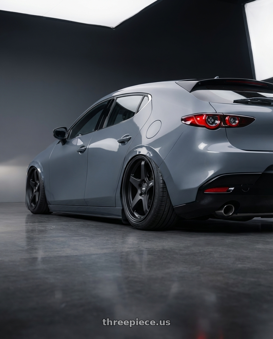 2023 Mazda Mazda3 Turbo with ESR Wheels APEX SERIES AP5 5x114.3 18x9.5 +22 Matte Black wheels rear three quarter view slight stretch tires