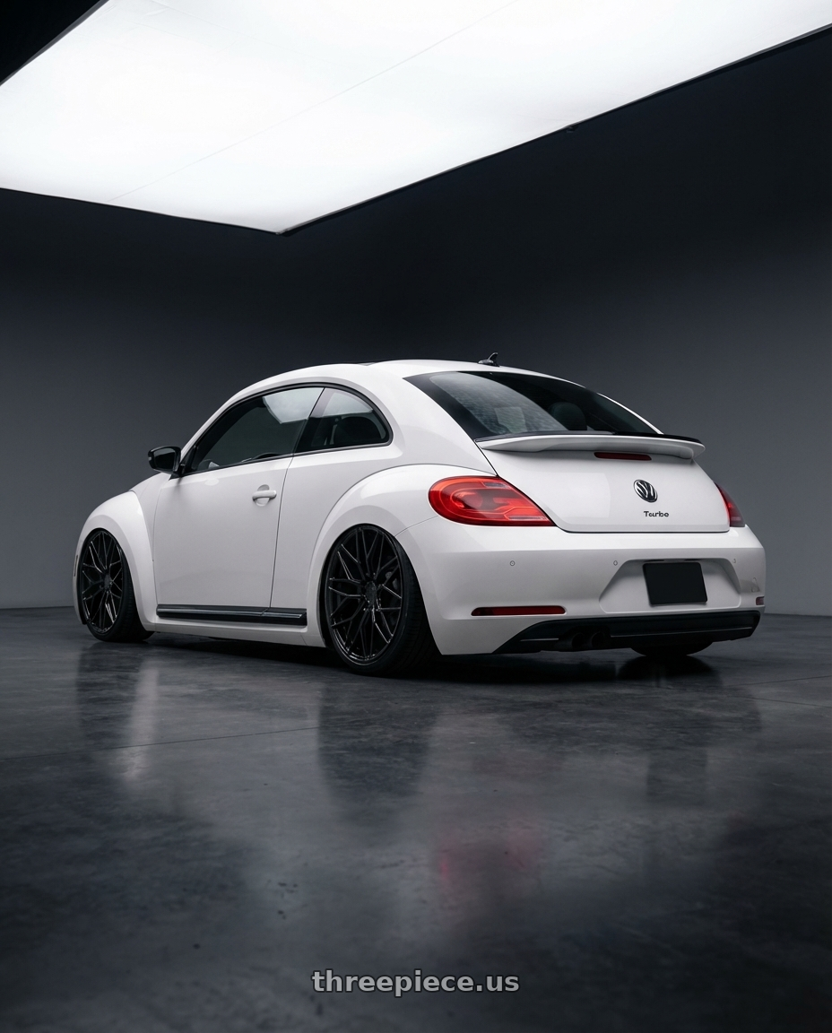 2016 Volkswagen Beetle Turbo with Avant Garde Wheels M520R 5X112 19x8.5 +35 Gloss Black wheels rear three quarter view slight stretch tires