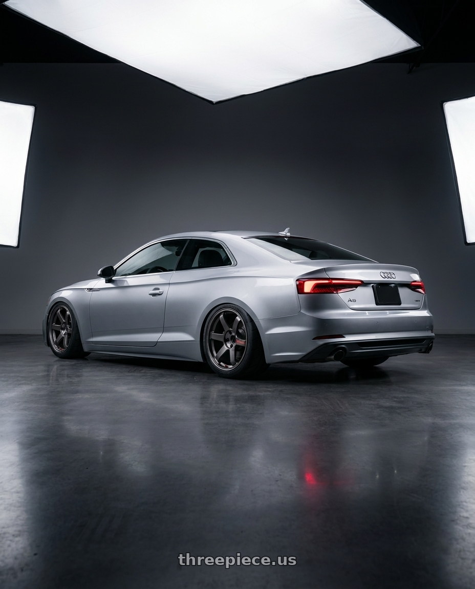 2018 Audi A5 with Volk Racing TE37 Saga SL 5x114.3 18x10.5+15 Pressed Graphite wheels rear three quarter view meaty tires