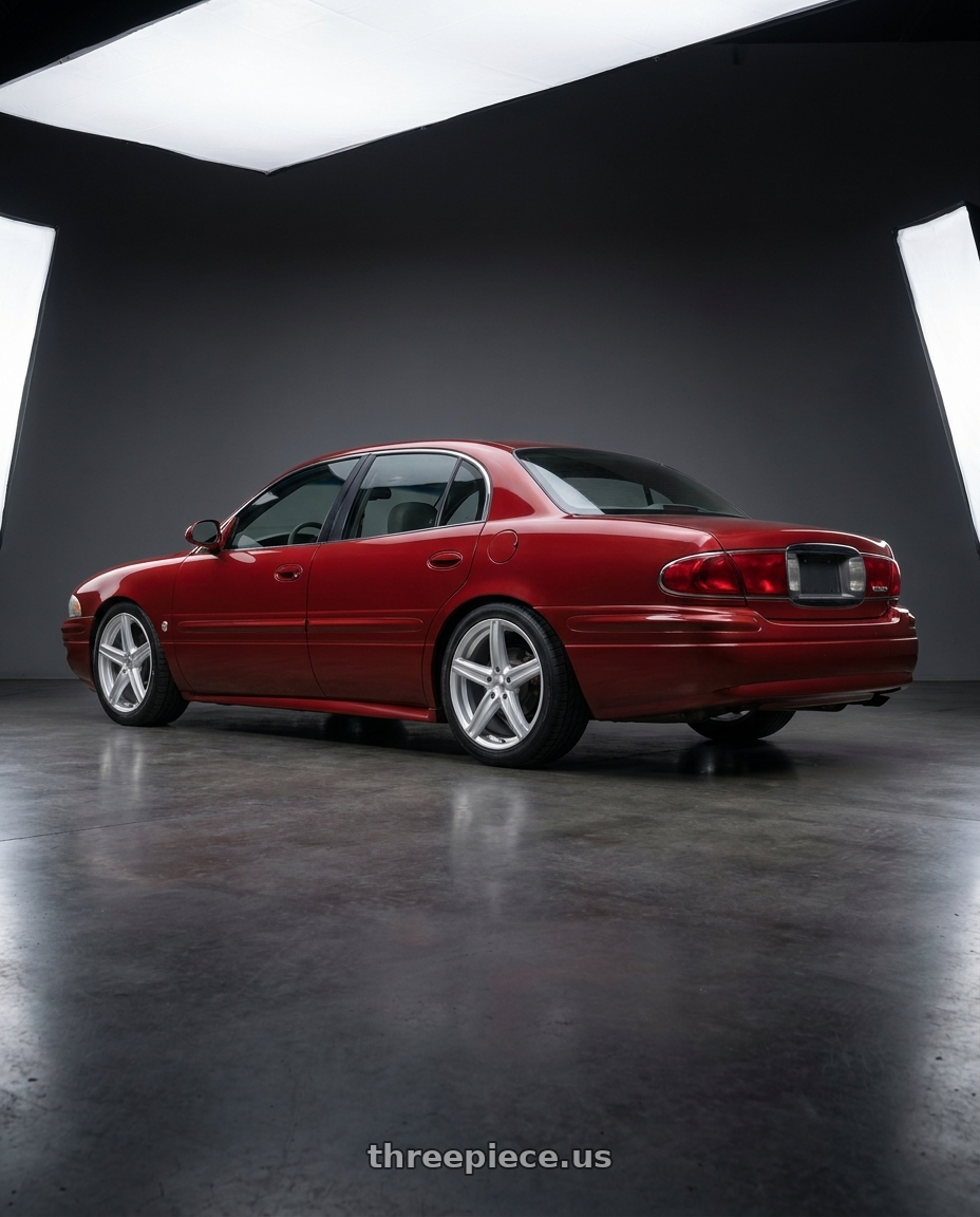 2002 Buick LeSabre with Vision Street-Designs 469 Boost 5x115 16x7+38 Silver wheels rear three quarter view square tires