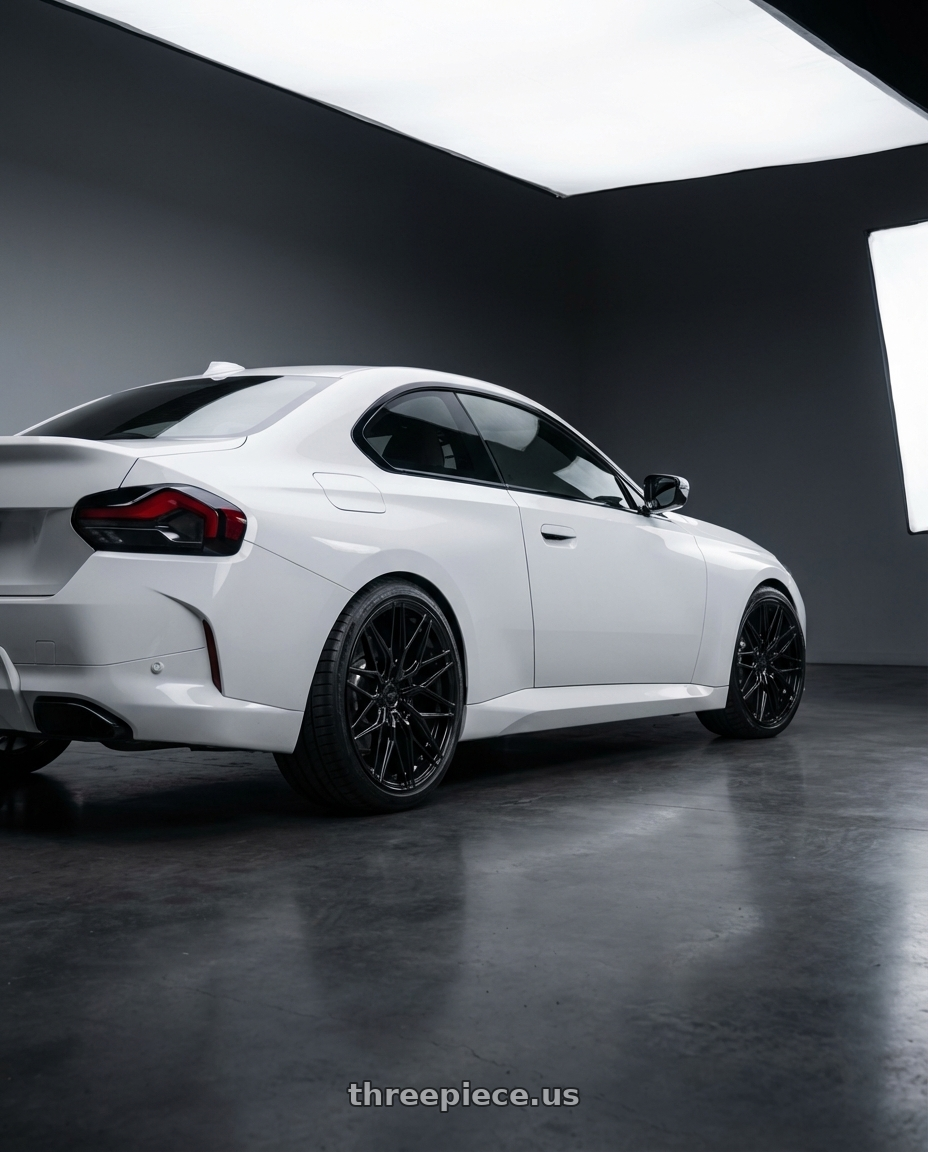 2024 BMW 2 Series G42 with Avant Garde Wheels M520R 5X112 19x9.5 +40 Gloss Black wheels rear three quarter view square tires