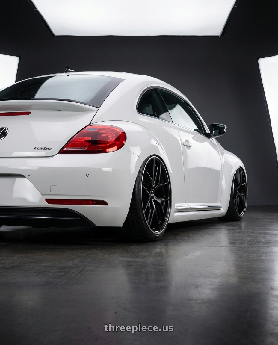 2016 Volkswagen Beetle Turbo with BBS CC-R 5x112 19x8.0+27 Satin Black wheels rear three quarter view slight stretch tires