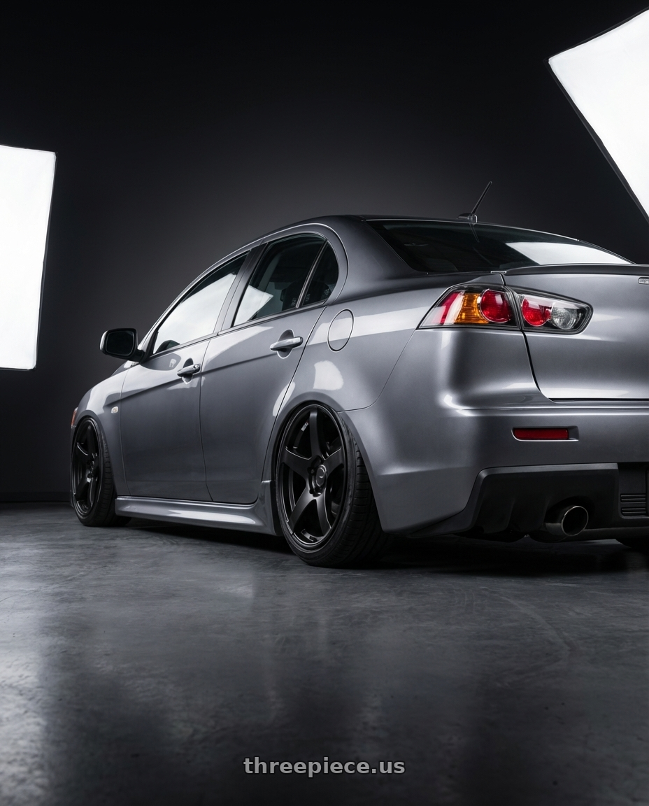 2014 Mitsubishi Lancer Ralliart with Ssr Gtv01 5x114.3 18x9+35  FLAT BLACK wheels rear three quarter view slight stretch tires