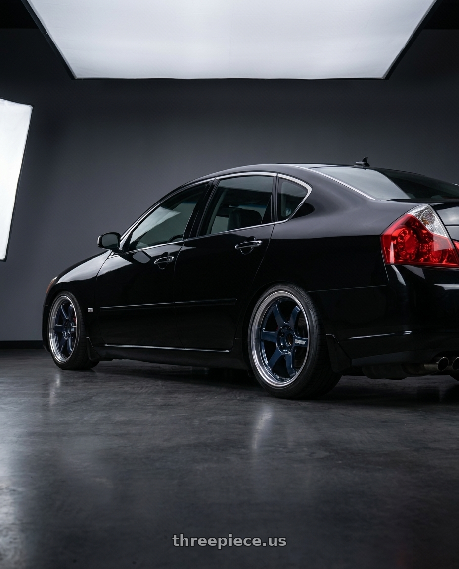 2008 Infiniti m35 with Volk Racing 21C 5x114.3 18x9.5 +20 MAG BLUE / RIM DC wheels rear three quarter view slight stretch tires