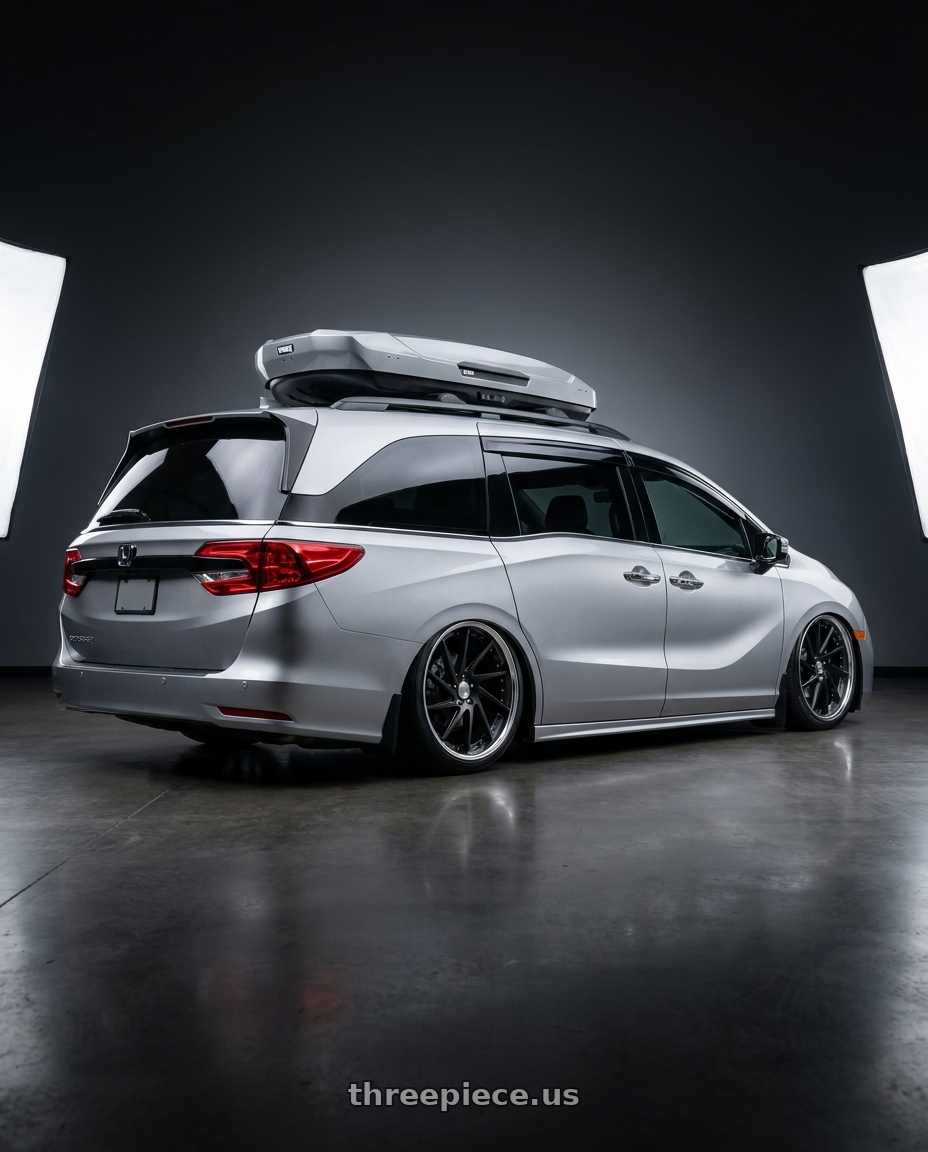 2024 Honda Odyssey with Work Gnosis Cvs 5x120 20x8.5+45 W Disk Matte Black wheels rear three quarter view square tires