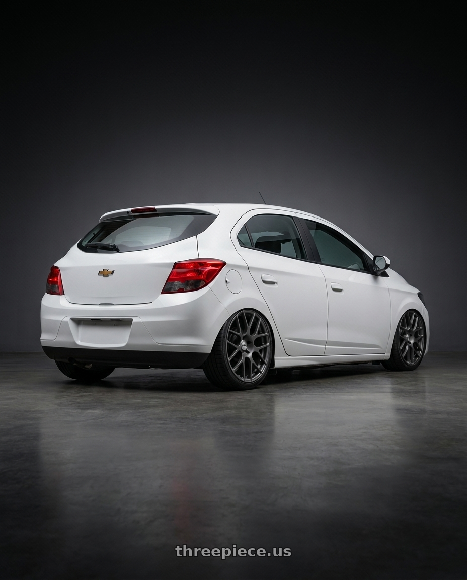 2012 CHEVROLET ONIX with TSW NURBURGRING 5X114.3 17X7.5 +45 MATTE GUNMETAL wheels rear three quarter view square tires