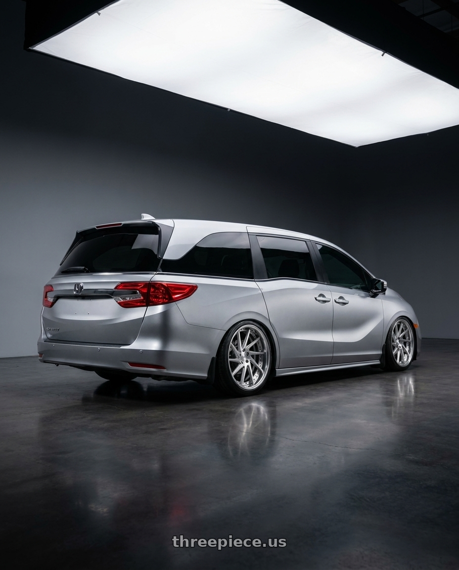 2024 Honda Odyssey with Work Gnosis Cvs 5x120 20x8.5+45 H Disk Composite Buffed And Brushed wheels rear three quarter view slight stretch tires