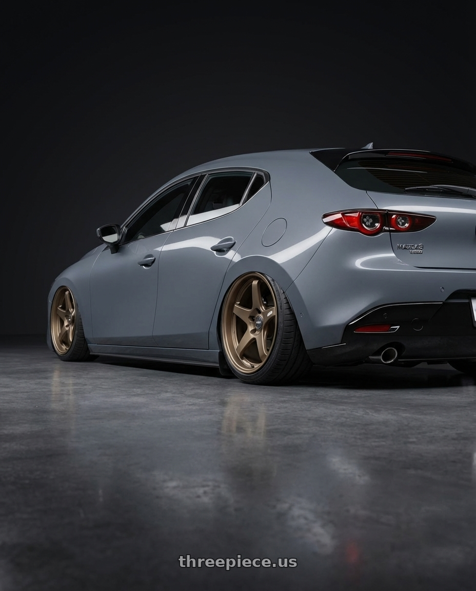 2023 Mazda Mazda3 Turbo with ESR Wheels APEX SERIES AP5 5x114.3 18x10.5 +22 Matte Bronze wheels rear three quarter view slight stretch tires