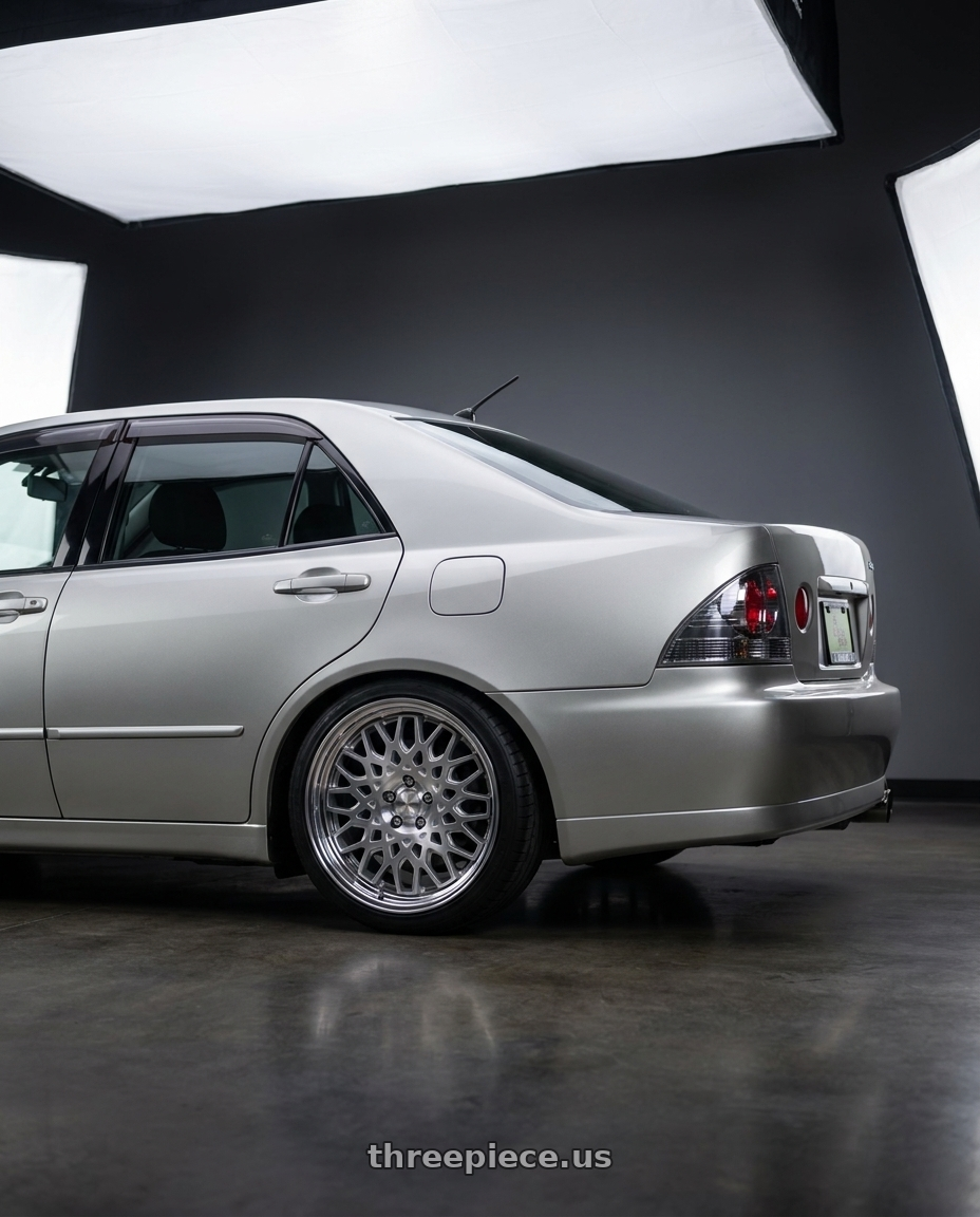 1999 Toyota Altezza, Millennium Silver with Work Seeker Cx 5x114.3 17x8+38 O Disk Matte Silver Polish wheels rear three quarter view square tires