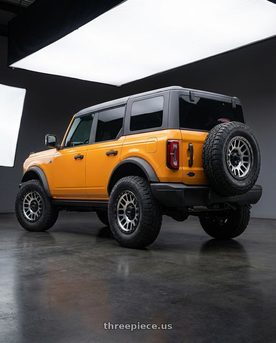 2024 Ford Bronco with Vision Off-Road 111 Nemesis 6x139.7 17x9-12 Matte Black Machined Face wheels rear three quarter view meaty tires