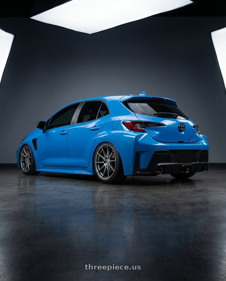 2024 Toyota GR Corolla with Aodhan AH09 5x114.3 18x9.5 +35 Hyper Black wheels rear three quarter view slight stretch tires