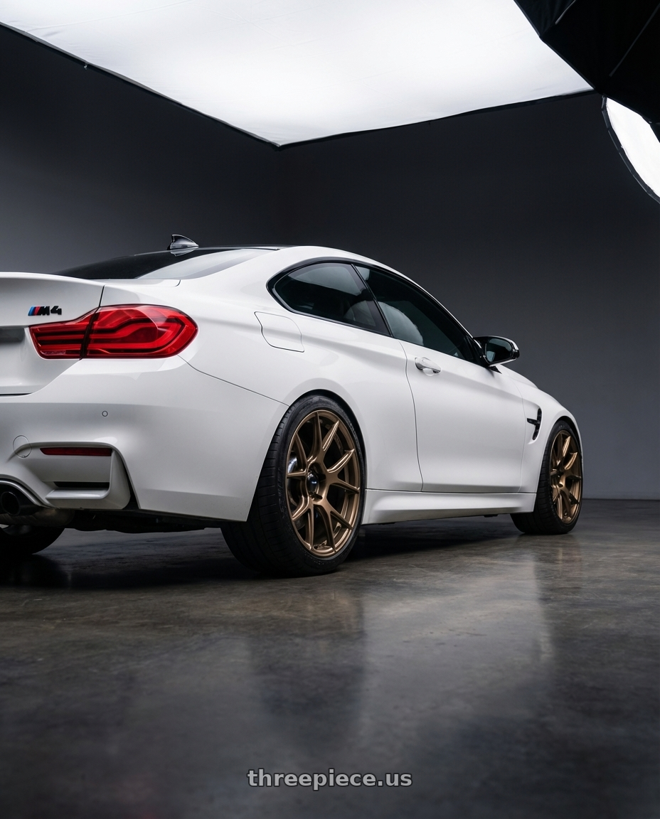 2018 BMW M4 F82 with Konig Ampliform 5x120 19x8.5+32 Gloss Bronze wheels rear three quarter view square tires