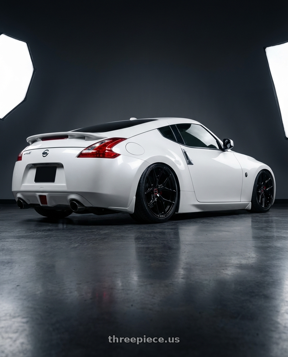 2019 Nissan 370Z with Vossen HF-5 19x8.5 / 5x114.3 / ET32 / Flat Face / 73.1 - Gloss Black Wheel - HF5-9N60 wheels rear three quarter view slight stretch tires